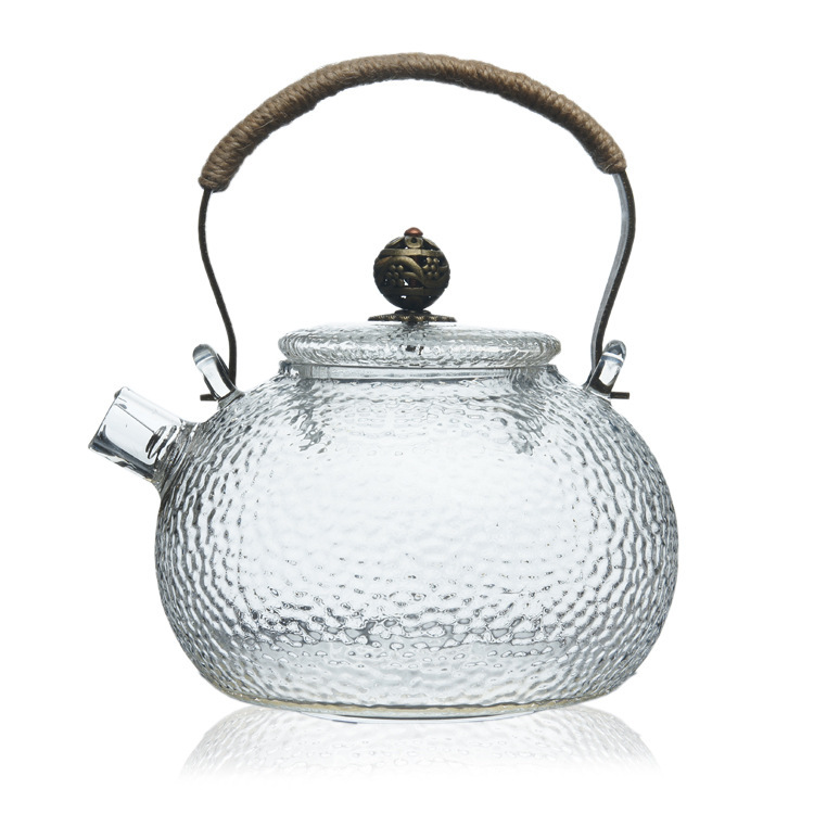 Wholesale high borosilicate glass teapots, thickened high-temperature resistant hammered glass teapots, copper handle teapots, filter spout flower teapots Item Picture