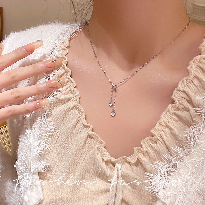 Shell heart titanium steel necklace for women, light luxury, niche design, high-end feel, best-selling tassel collarbone chain necklace accessory Application Scenario