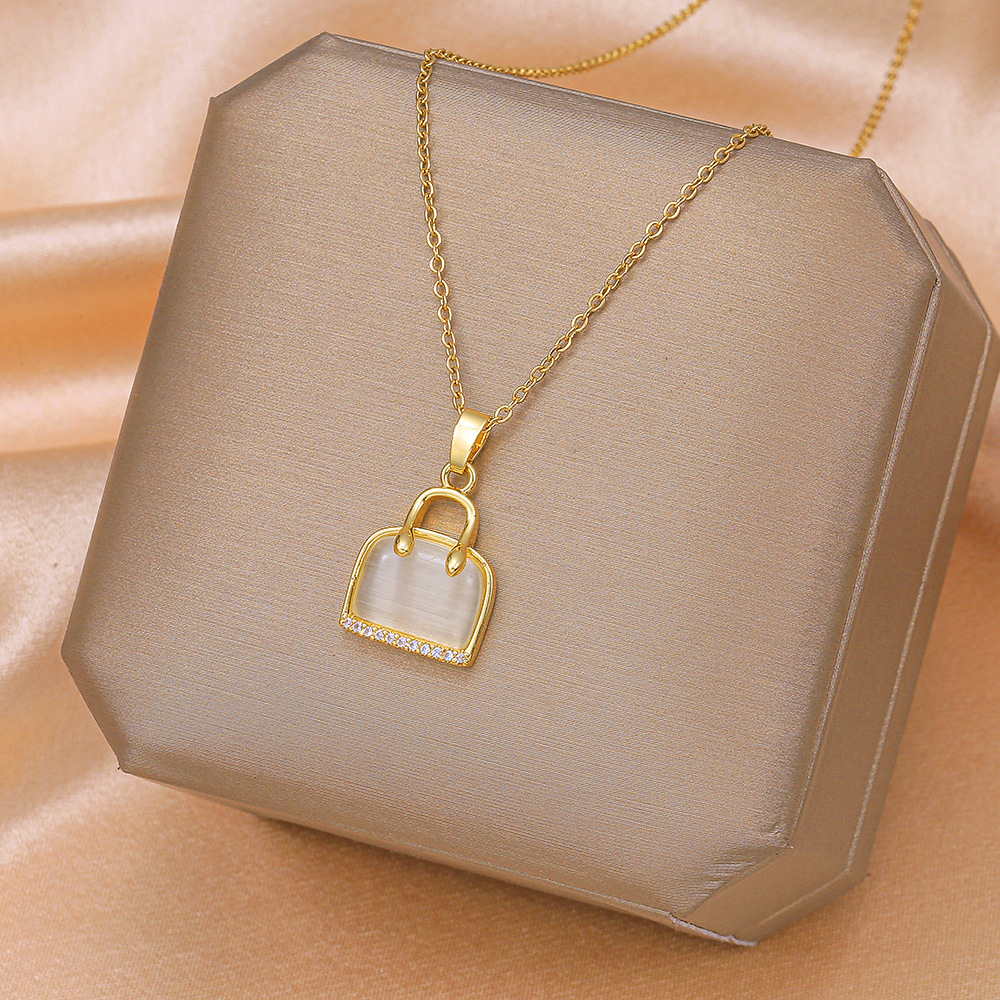 Stylish and elegant cat's eye stone bag, necklace, women's niche design sense, Internet celebrity collarbone chain, simple and versatile titanium steel jewelry details Picture