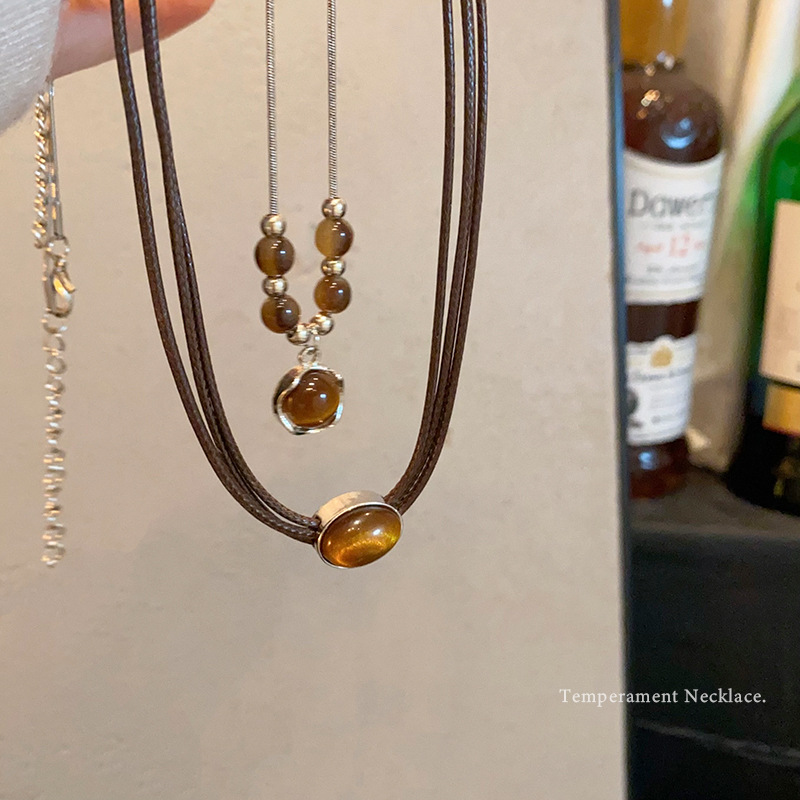 This autumn and winter vintage tiger's eye necklace is a versatile and elegant sweater chain with a high-end look. It's the same style as the popular collarbone chain necklace Specification drawing