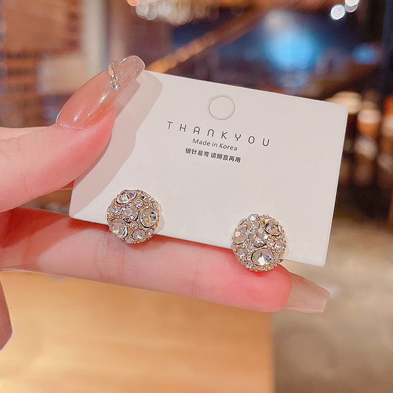 Japanese and Korean style super shiny design magnetic earrings, a niche creative female influencer, no ear piercings, ear bone clips, a unique earpiece full figure