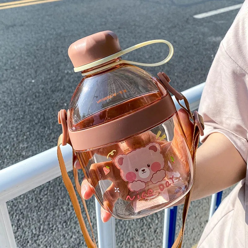 Cute and creative water cup for direct drinking, portable outdoor slanted water bottle, high appearance level cartoon student and children's plastic cup Application Scenario