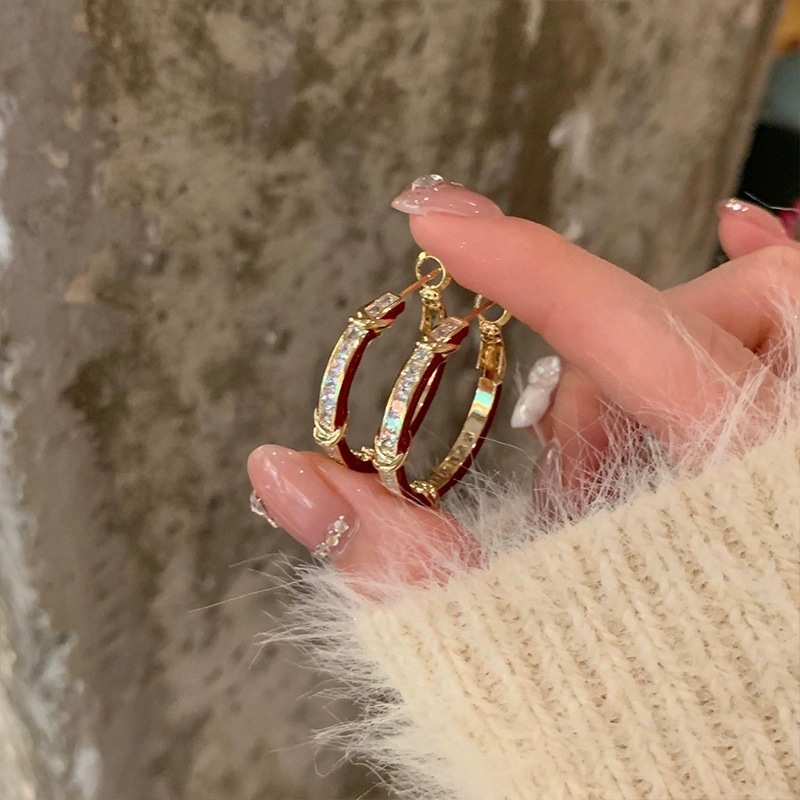 High-end and light luxury zirconium enamel oil drop ear rings for women, European and American style, exaggerated round face slimming, versatile ear buckles, elegant earrings full figure