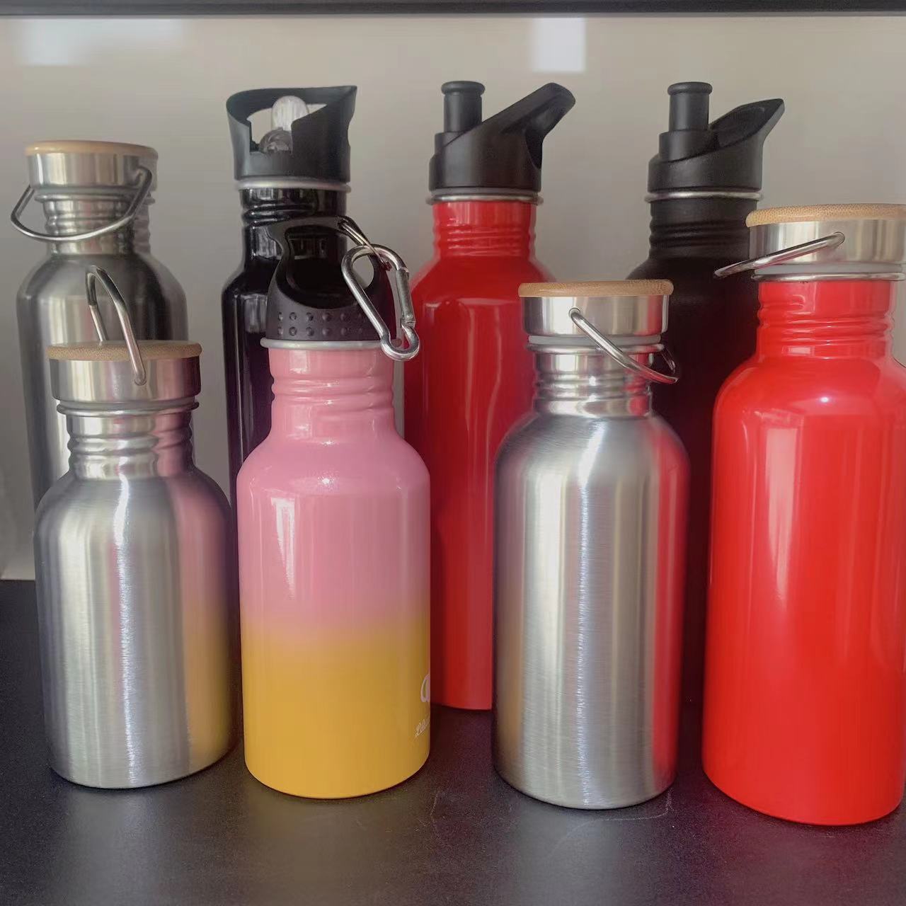 Customized 304 stainless steel large-mouth sports water bottle, American-style outdoor handle single-layer cross-border mountaineering portable cold water bottle full figure