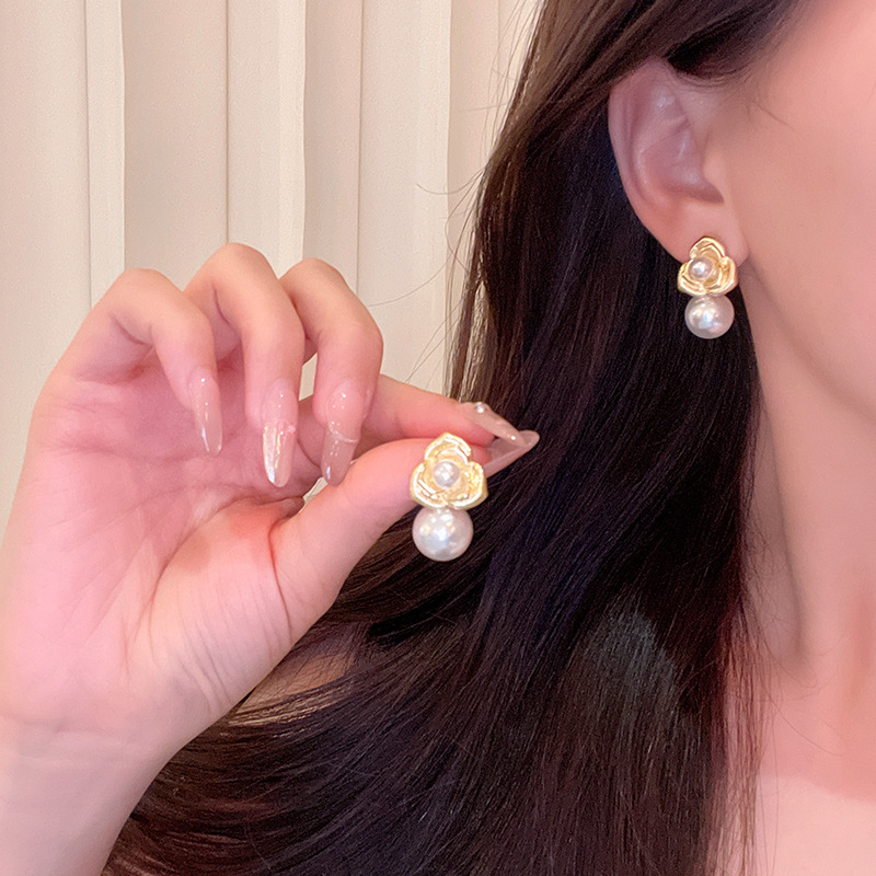Golden camellia pearl earrings for women, with a light luxury, niche and high-end feel, unique stud earrings, elegant and exquisite, are popular earrings on the Internet details Picture