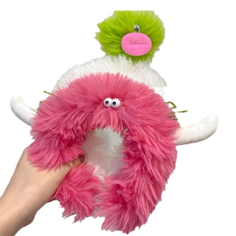 My daughter, Liu Yan, has the same cute and cartoonish little monster plush headband. It's a hair tie for washing the face and applying facial masks Item Picture