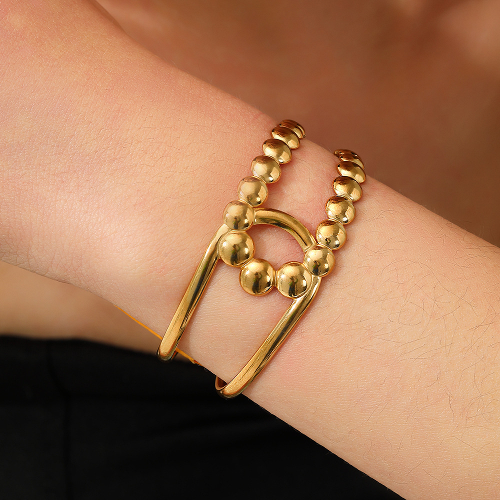 This cross-border gold-plated bracelet from Europe and America is a bestseller with a high-end touch. It features an original design with a polka dot finish and a Bohemian style Specification drawing