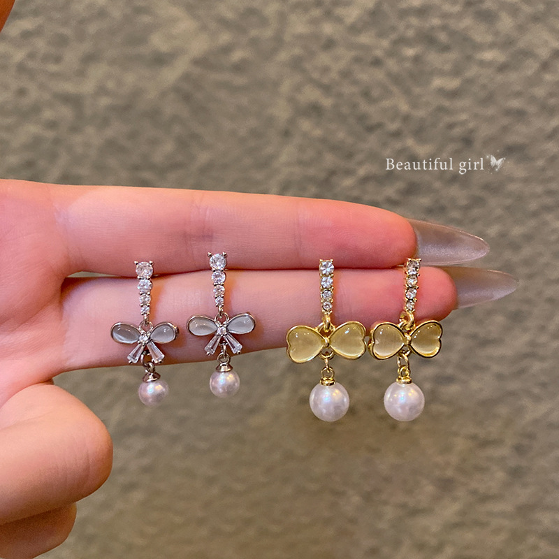 Diamond-encrusted cat's eye stone tassel bow stud earrings, women's niche design sense pearl earrings, summer bestsellers wholesale Specification drawing