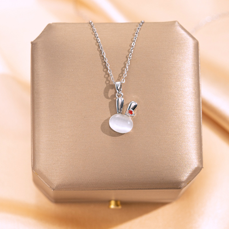Silver cat's eye stone little rabbit necklace, a unique and light luxury design for women, a popular collarbone chain, a versatile titanium steel accessory full figure