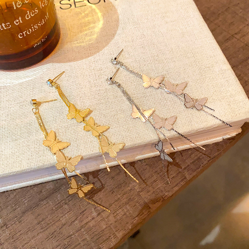 The super ethereal butterfly tassel stud earrings are fashionable and elegant for women, with a light luxury and high-end feel. The long zirconia earrings are slightly inlaid Specification drawing