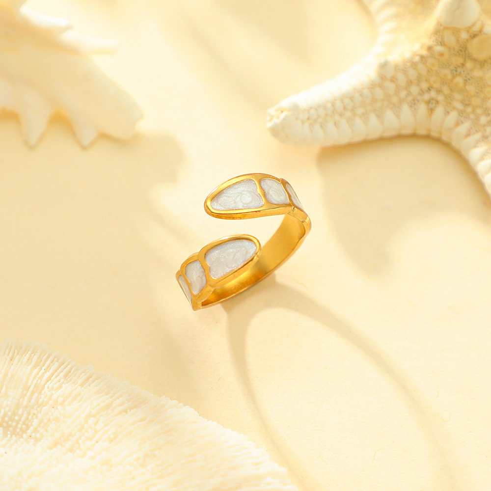 Cross-border new product: Personalized and versatile, with an open design, fashionable ring, oil-dripping, hollowed-out, high-end stainless steel ring for women details Picture