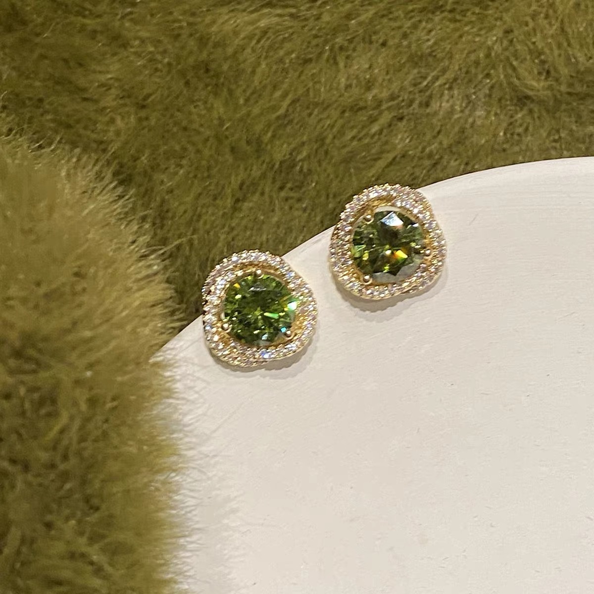 Olive green zircon entwined earrings for women, light luxury, niche and high-end style, ear studs without ear holes, mosquito repellent coil ear clips for women Application Scenario