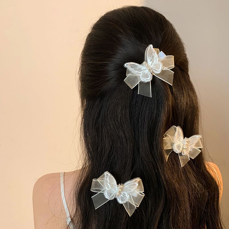 Super fairy-like white gauze pearl butterfly hairpin, sweet forest-style bow, small hairpin with braided hair accessory at the edge details Picture