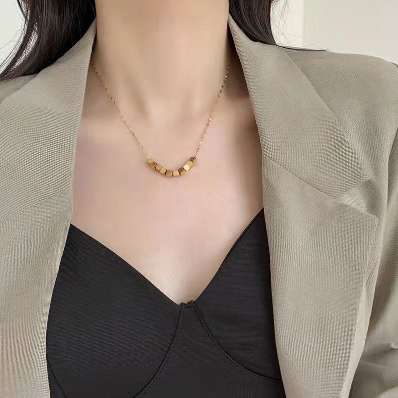 A perfect and elegant small square geometric pendant titanium steel necklace with a unique design sense and a light luxury collarbone chain for women Application Scenario