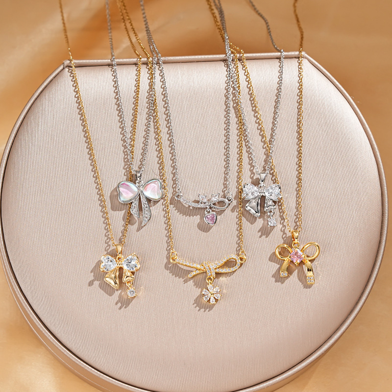Korean InS-style zircon bow pendant titanium steel necklace women's fashion colorful tassel collarbone chain accessory wholesale full figure