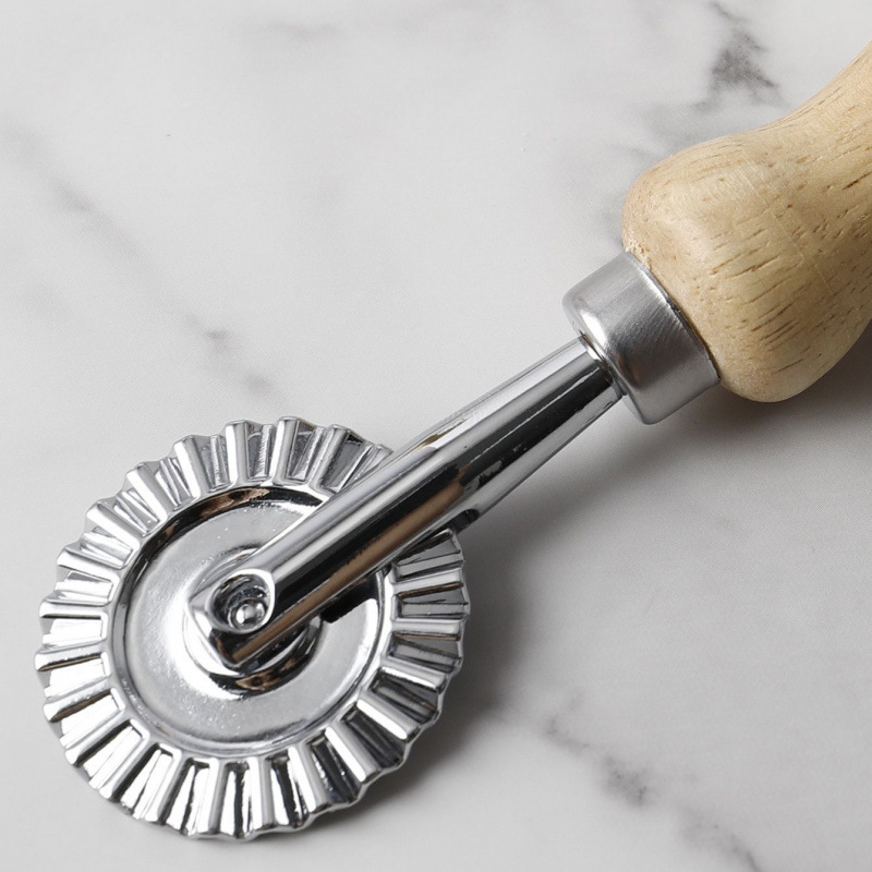 Lace roller cutter, a diy handmade baking tool for the kitchen, with a zinc alloy oak handle and a fancy roller cutter full figure