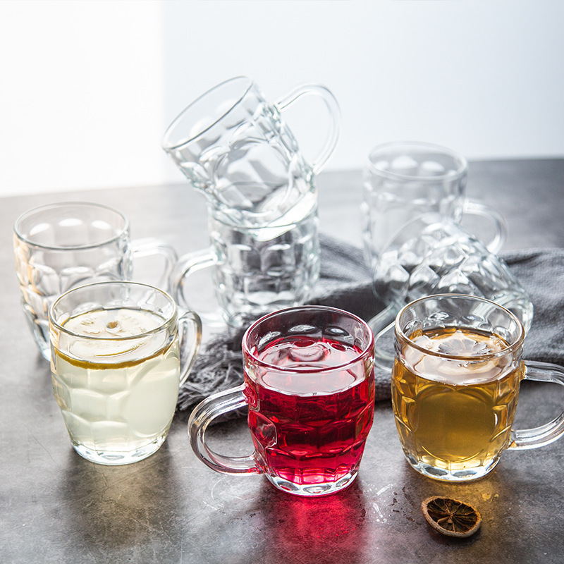 Wholesale of green apple creative pineapple handle cups, beer mugs, juice cups, milk tea cups, water cups and glass cups with logo printing details Picture