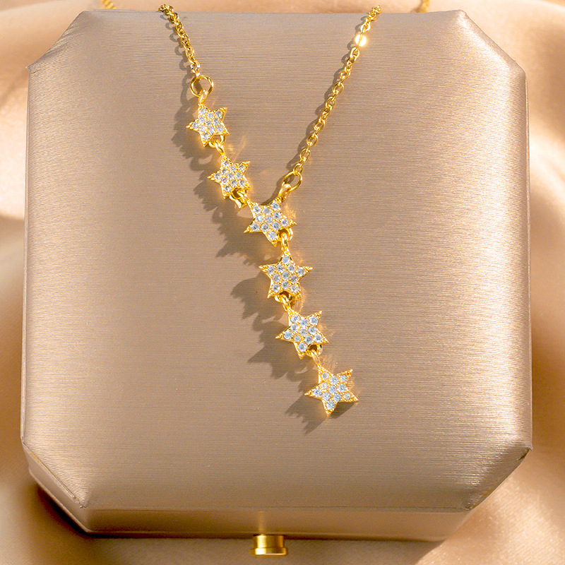 A fashionable and light luxury titanium steel necklace with a starry sky, featuring a niche design for women with tassels and star-shaped collarbone chains, is a trendy and elegant accessory full figure