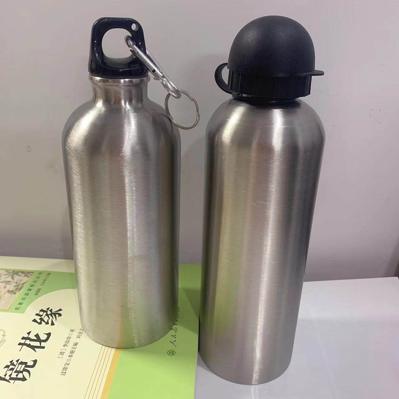 Cross-border single-layer stainless steel small-mouthed sports water bottle, suitable for outdoor cycling and mountain climbing, carrying handle cold water bottle gift cup full figure