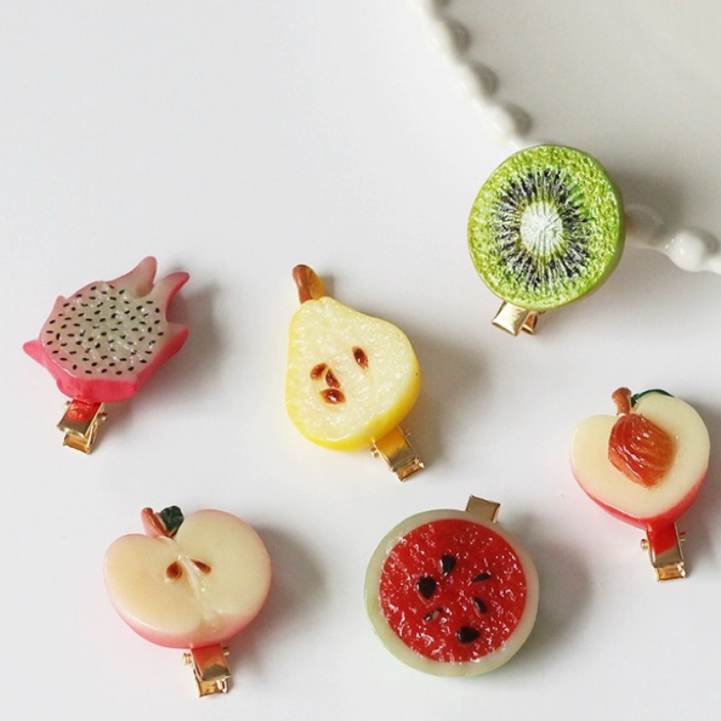 Creative simulation fruit slices: watermelon, pitaya, peach, kiwi. Cute and funny photos with fruit hairpins on the sides full figure