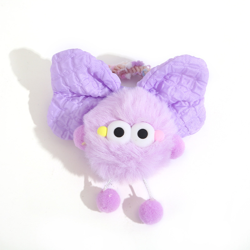 The cute plush ball hair tie for girls' hair ties won't damage hair. New style hair band for autumn and winter 2024 Item Picture