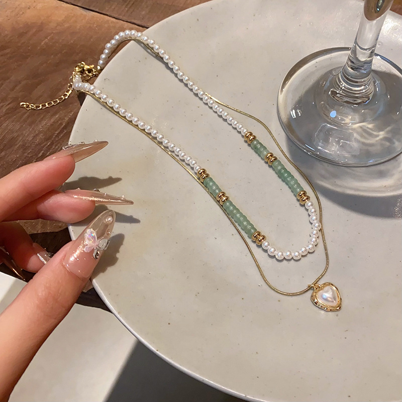 Double-layer pearl heart-shaped necklace, a trendy and versatile sweater chain for women on Instagram, with a high-end and light luxury collarbone chain accessory Specification drawing