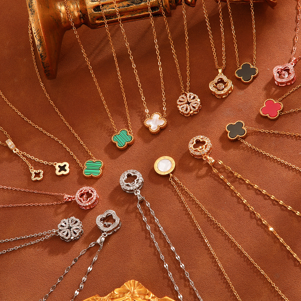 Cross-border copper micro-inlaid rhinestone four-leaf clover necklace, women's titanium steel non-fading, light luxury and high-end collarbone chain accessory manufacturer full figure