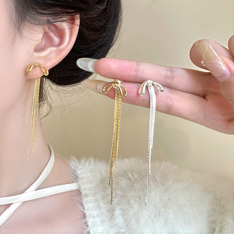 Silver bow tassel earrings for women, a new 2025 bestseller with a high-end feel. One pair of earrings with a cool and refreshing look full figure