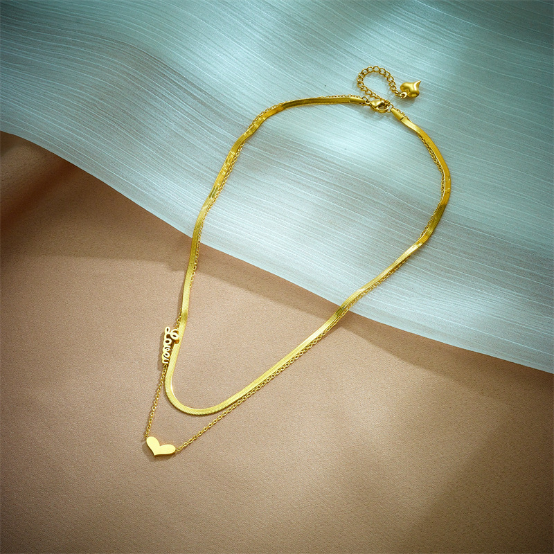 Korean-style fashionable and niche design double-layer overlapping snake bone chain heart-shaped letter pendant chain titanium steel jewelry necklace details Picture