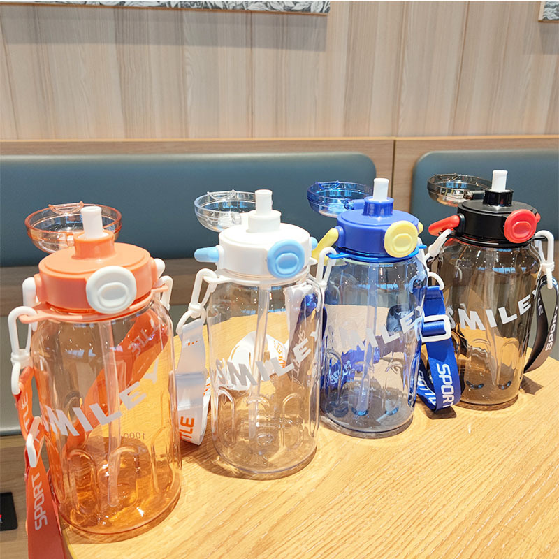 1000ml transparent plastic cup, Amazon's popular sports and fitness style, with a crossbody strap and a jumping lid straw cup full figure