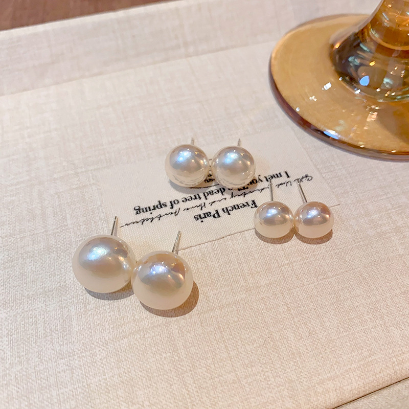 Steamed bun champagne-colored pearl stud earrings for women, light luxury, versatile, elegant and high-end, the same style of earrings as those of Internet celebrities full figure
