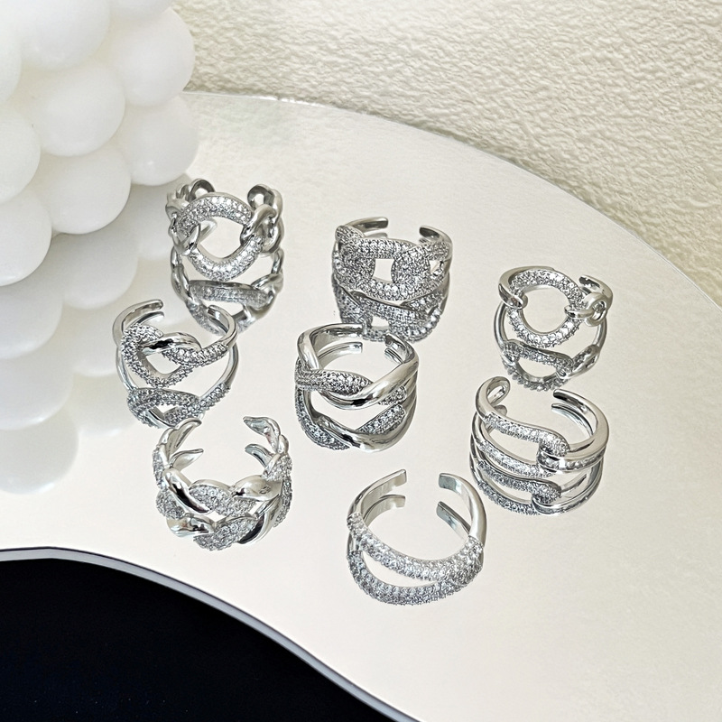 This is a unique and cool design for women, featuring a super sparkling ring with a twist and full diamond zirconia open ring. It's a trendy and luxurious ring Application Scenario