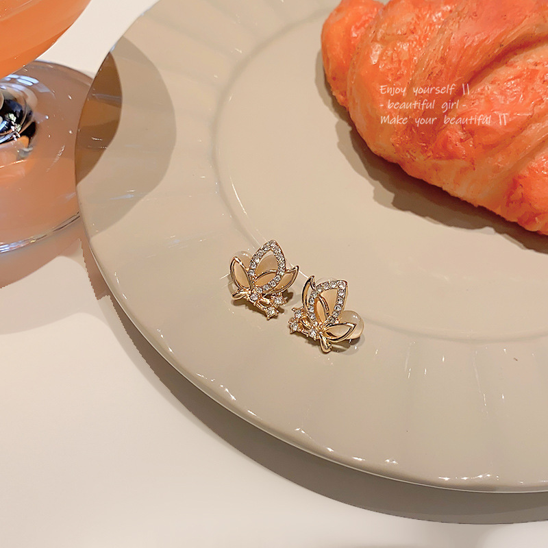 S925 Silver Needle, super ethereal charm, cat's eye butterfly earrings, women's light luxury and high-end feel, full diamond zircon stud earrings Application Scenario