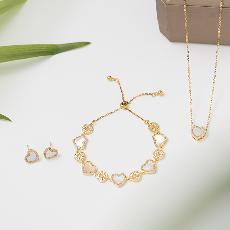 Natural colored shell heart set necklace, women's niche light luxury style bracelet, stud earrings, fashionable and versatile three-piece set full figure