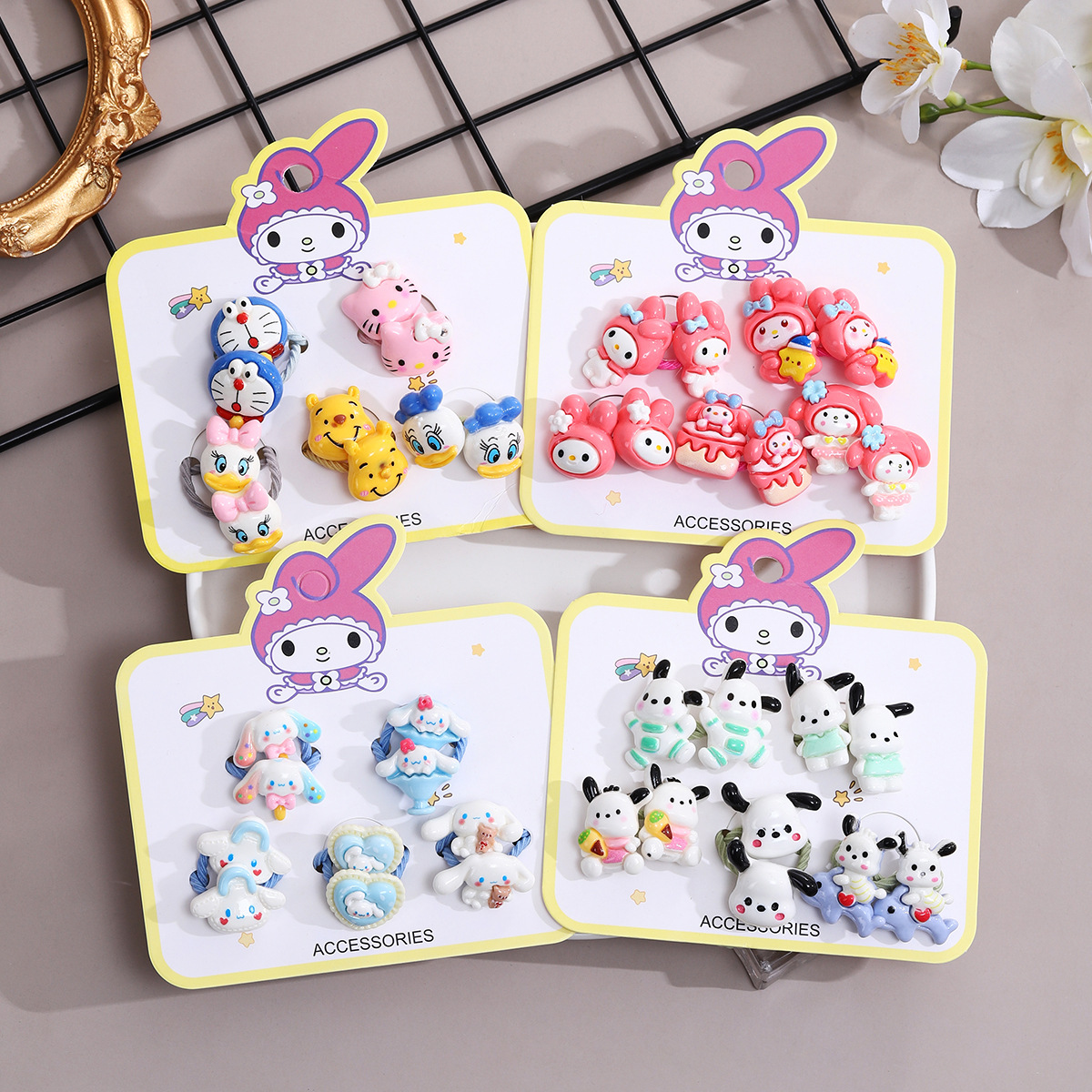 Cute cartoon children's hair band girl Kuromi Sanrio tied her hair into a bun with a rubber band that won't damage her hair baby hair accessory full figure