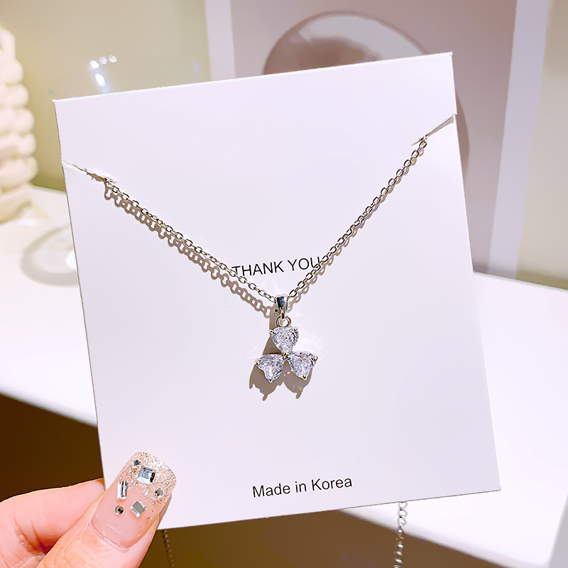A Korean version of a niche design with three heart-shaped clover necklaces, simple and versatile for women, zircon pendant, and exquisite collarbone chain Application Scenario
