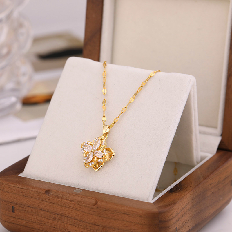 A full-diamond rotating four-leaf clover necklace for women with micro-inlaid double-layer zircon pendant and titanium steel collarbone chain, a simple and light luxury accessory details Picture