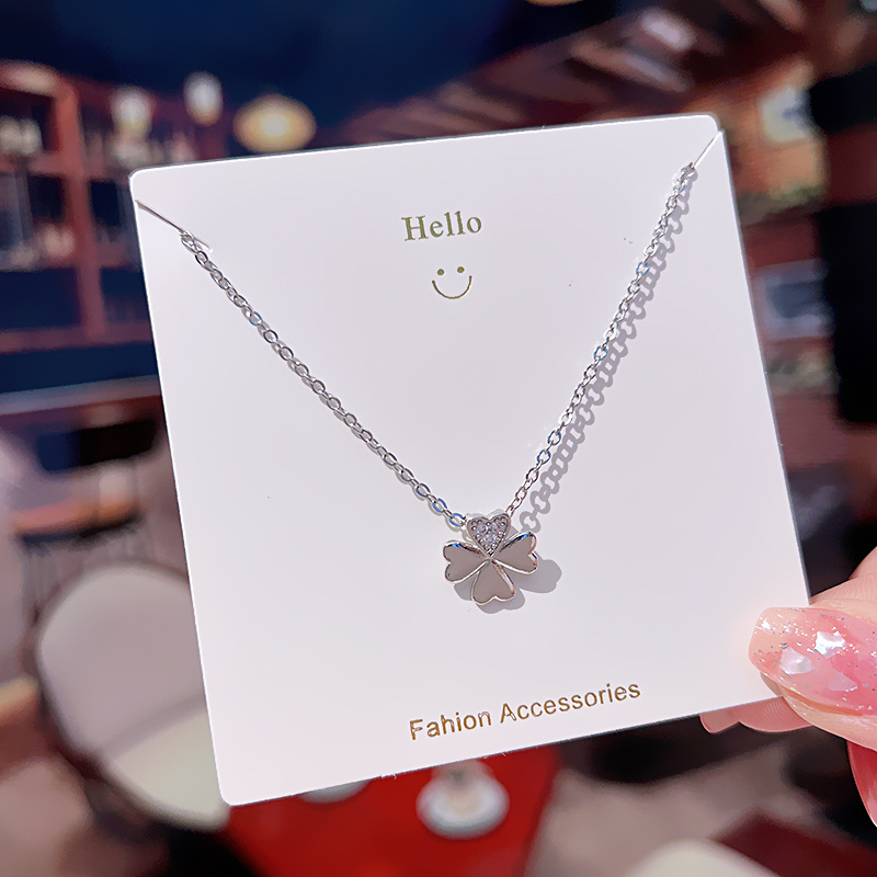 A Japanese and Korean style four-heart-shaped four-leaf clover titanium steel necklace for women, a simple silver diamond-encrusted collarbone chain, a niche internet-famous accessory details Picture