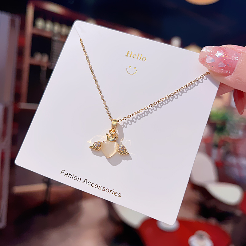 Cat's eye stone heart-shaped small wing necklace, a niche design for women, a popular collarbone chain, a cold style high-end neckchain accessory Specification drawing