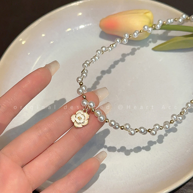 French pearl camellia necklace, a new high-end style for women in 2024, a popular collarbone chain and a trendy necklace accessory details Picture