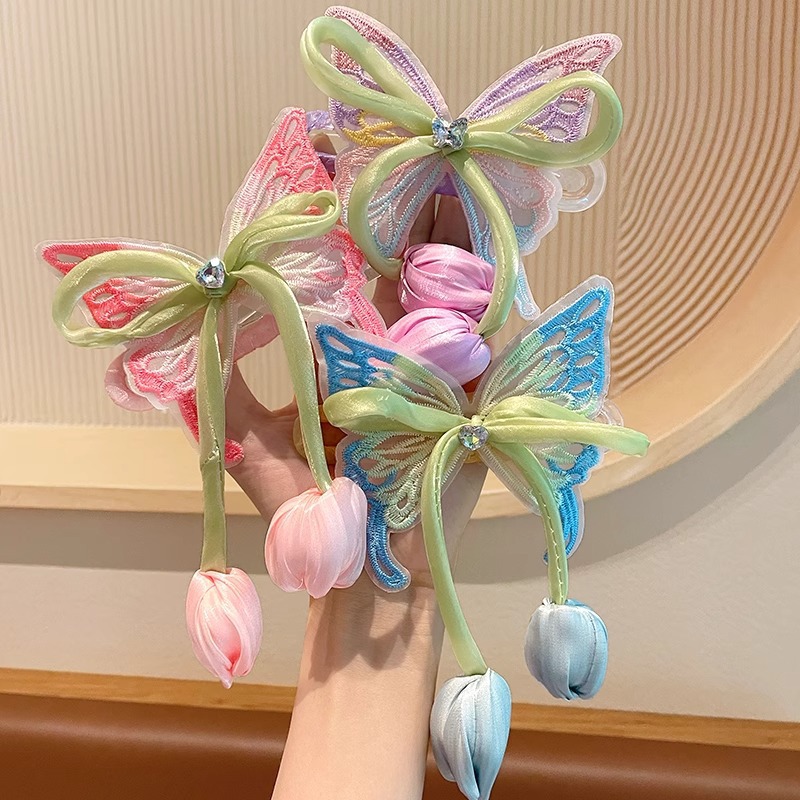 The new children's super fairy tulip butterfly hairpin, the back of the head ponytail clip, the girl princess hair accessory, is very stylish Application Scenario