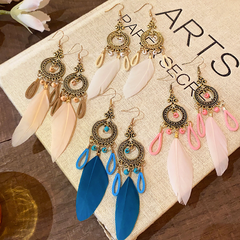 Bohemian ethnic style retro feather ear hook women's high-end and elegant long earrings, wholesale of popular earrings full figure