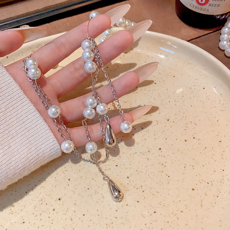 Water drop pearl tassel necklace for women, light luxury and niche style, beaded collarbone chain design sense, French retro accessory details Picture