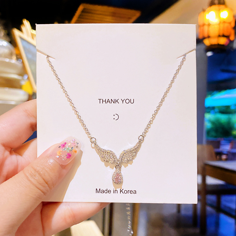 Fashionable Angel Wings Titanium steel necklace for women, set with pink teardrop zircon pendant, elegant and light luxury collarbone chain accessory Application Scenario