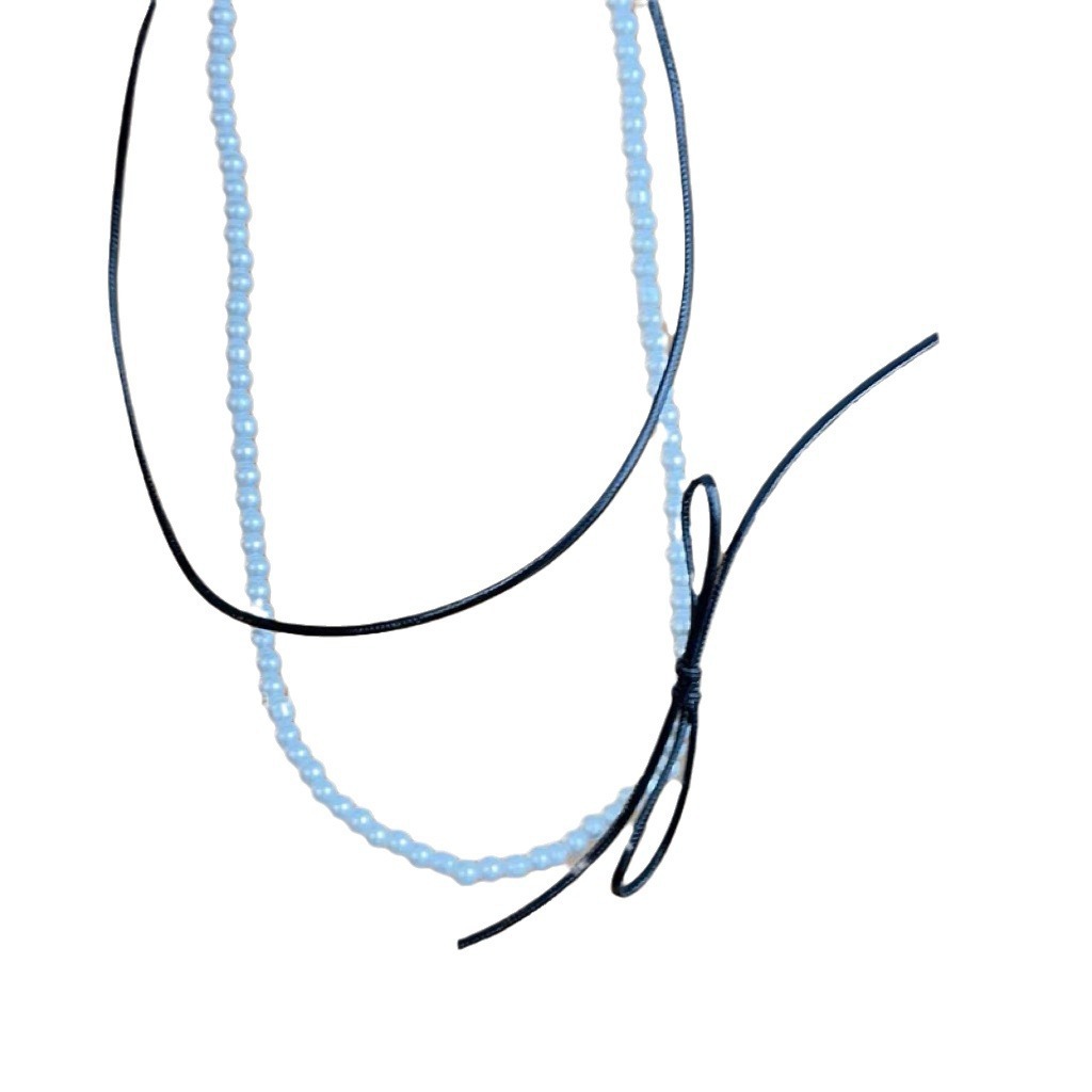 Double-layer stacked bow pearl necklace with a sweet and cool style and a niche design sense. Unique collarbone chain, a best-selling necklace wholesale Item Picture