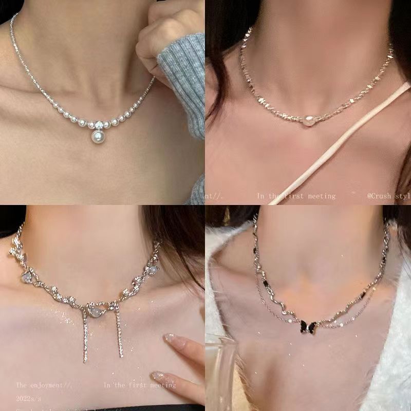 Ins-style pearl necklace, versatile and niche design, high-end and light luxury collarbone chain, heart-shaped pendant accessory wholesale full figure