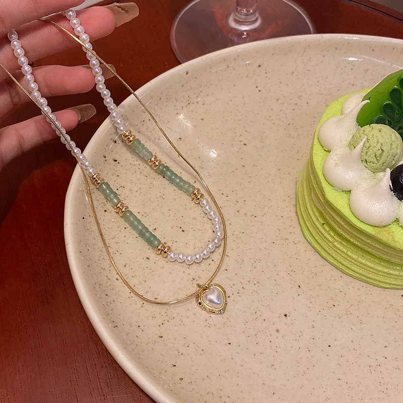 New Chinese-style double-layer pearl heart-shaped pendant necklace, a fashionable, high-end, versatile and elegant collarbone chain accessory for women Application Scenario