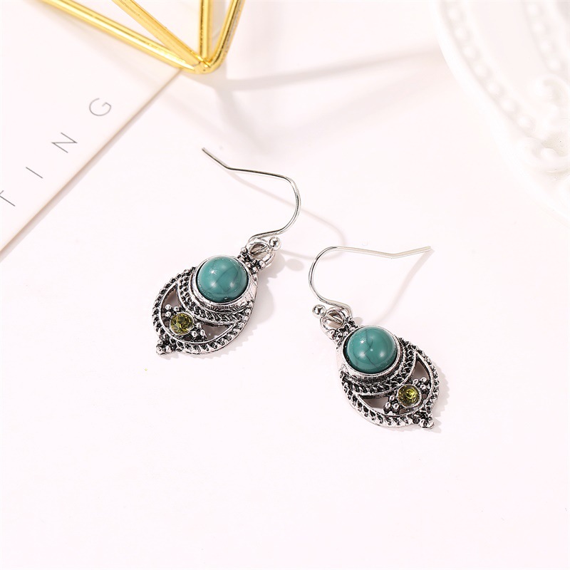 European and American simple earrings, Bohemian-style turquoise pendants, court retro hollowed-out carved ear hook earrings Application Scenario