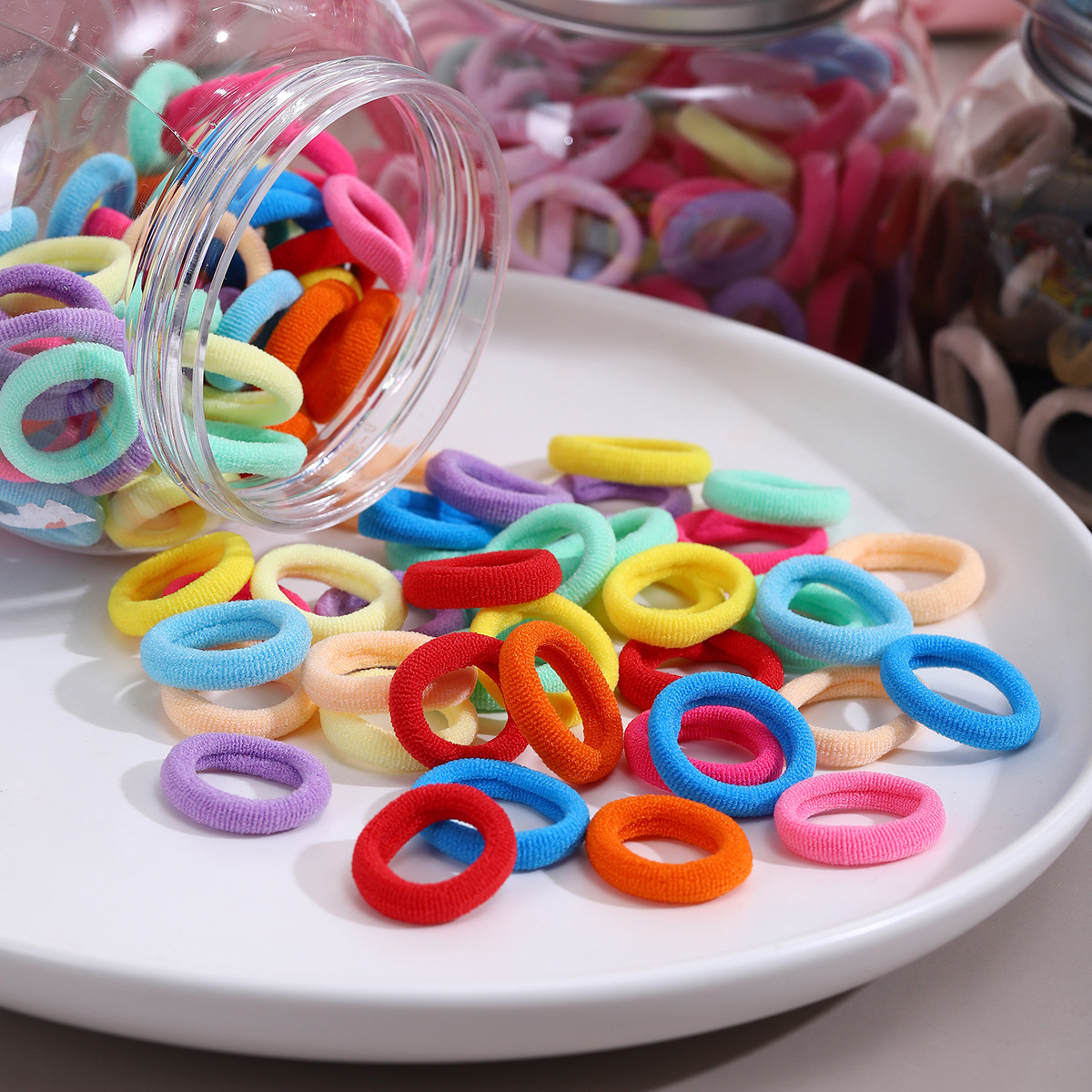 Children's hair bands do not damage hair. Baby towel bands. Cute girls. Candy-colored thumb rubber bands. Hair ties. Headwear Application Scenario