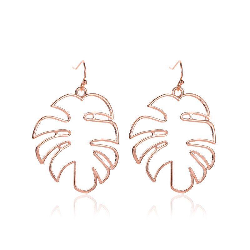 Cross-border best-selling earrings: Simple and retro ethnic style hollowed-out leaf earrings, trendy and individual banana leaf stud earrings for women Item Picture